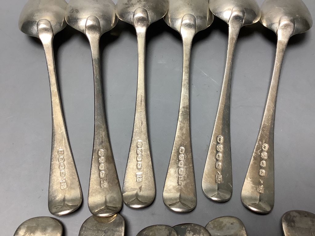 A set of six George III Old English silver dessert spoons, London 1805, Samuel Godbehere, Edward Wigan & James Boult and six Victorian Old English silver dinner forks, approximately 18oz